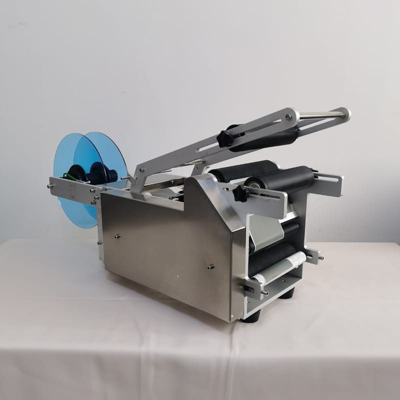 Labelling Machine (adhesive sticker to round bottle)